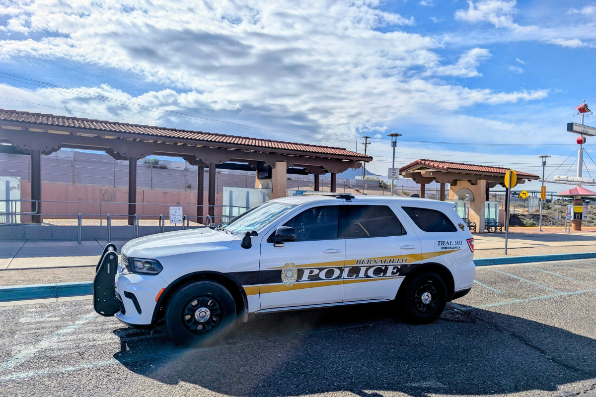 A man is in custody after an early-morning shooting near U.S. Highway 550 in Bernalillo triggered a multi-agency manhunt Tuesday that shut down Rail Runner service and forced Bernalillo Public Schools to cancel classes for the day.