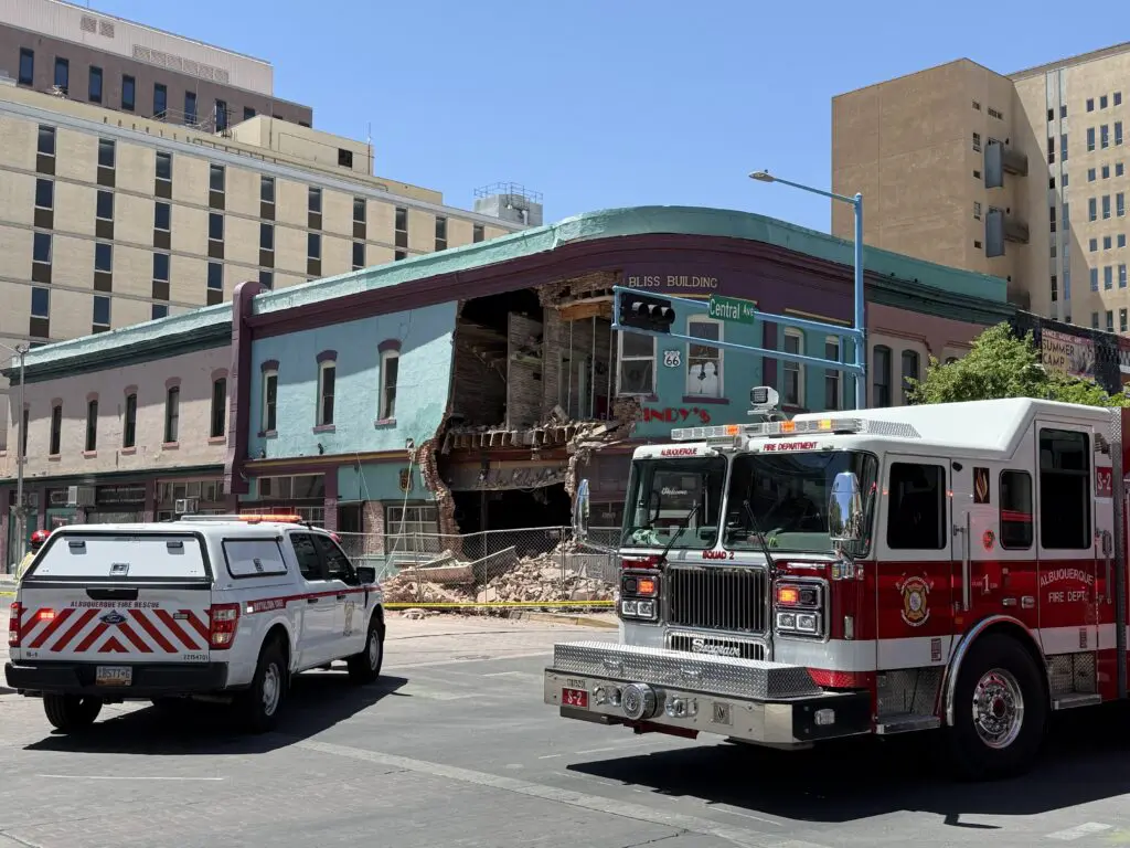 Albuquerque Fire & Rescue personnel respond to the Bliss Building where the exterior wall collapsed