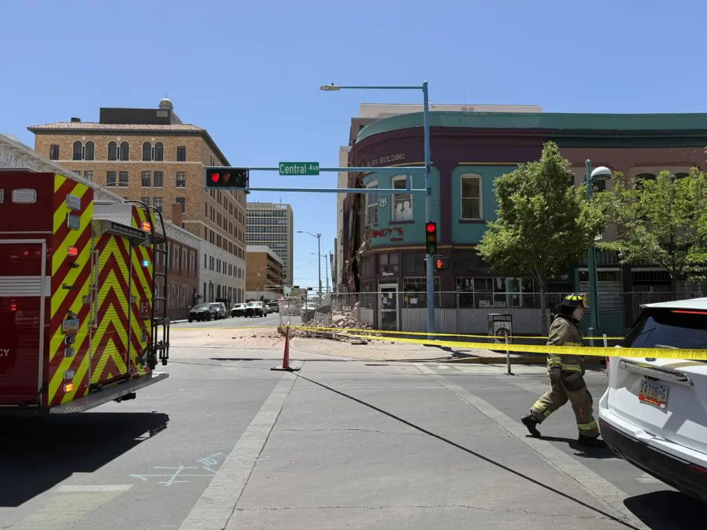 Albuquerque Fire & Rescue personnel respond to the Bliss Building where the exterior wall collapsed