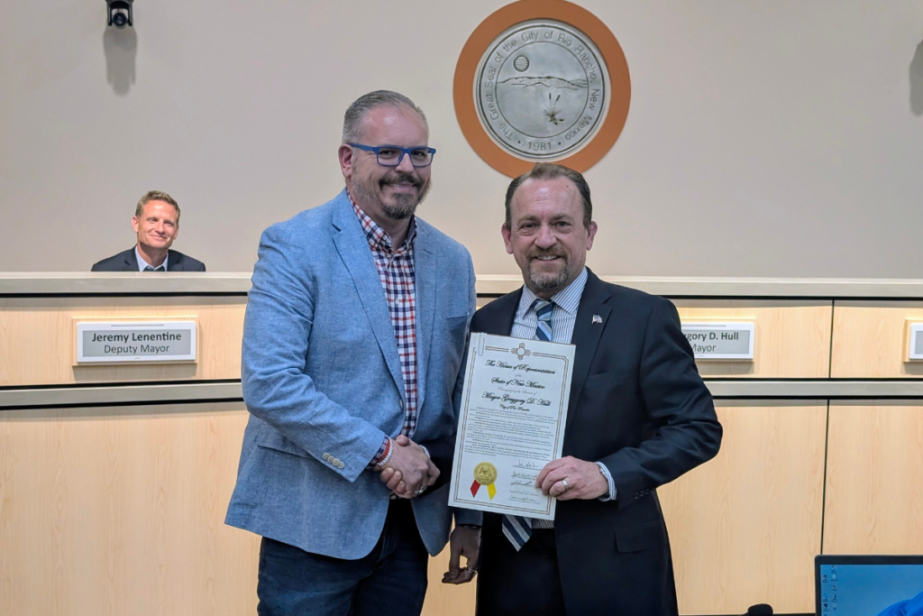 Rep. Josh Hernandez, left, presents Mayor Gregg Hull with a legislative certificate. (Kevin Hendricks)