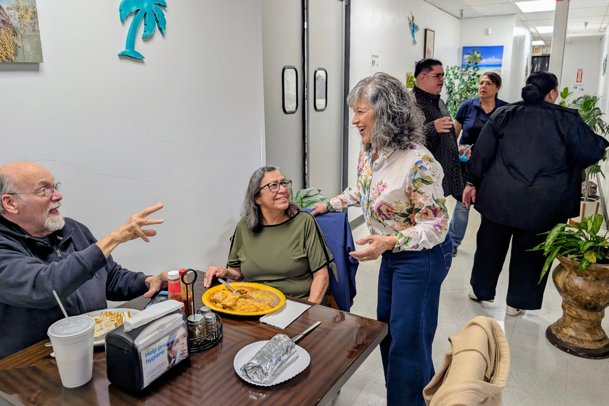 Rio Rancho mayoral candidate Alexandria Piland talks with supporters during her watch party on election runoff night. (Kevin Hendricks)