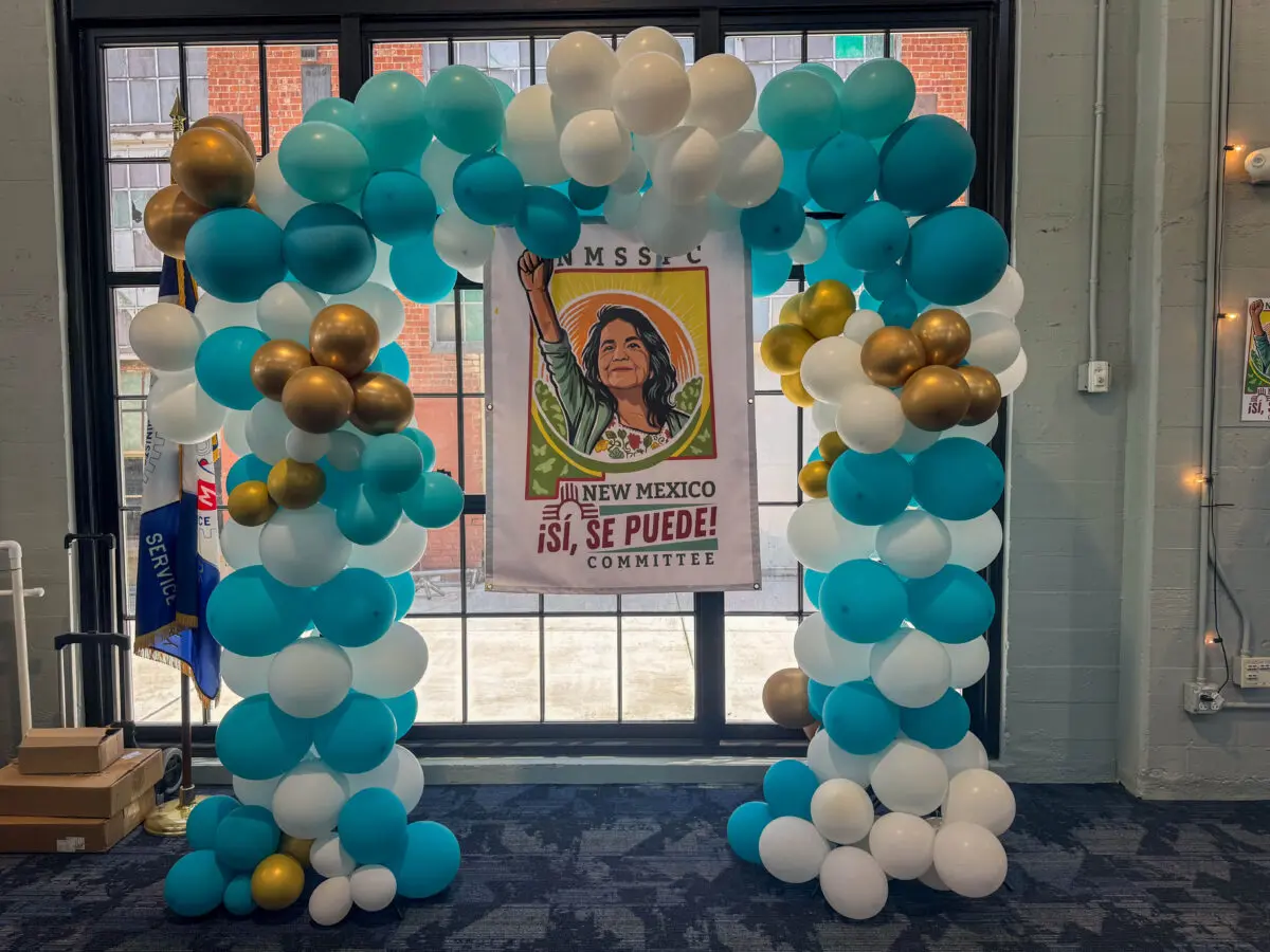 Banner with the committee's new name.