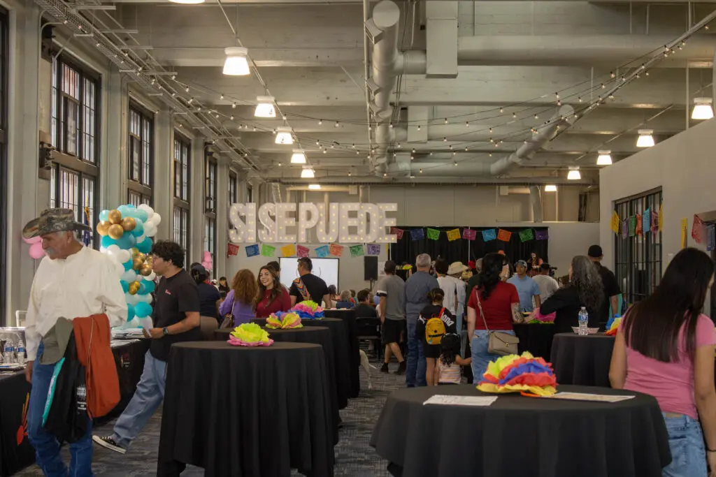 Inside a building at the Railyards during Voces de la Comunidad.