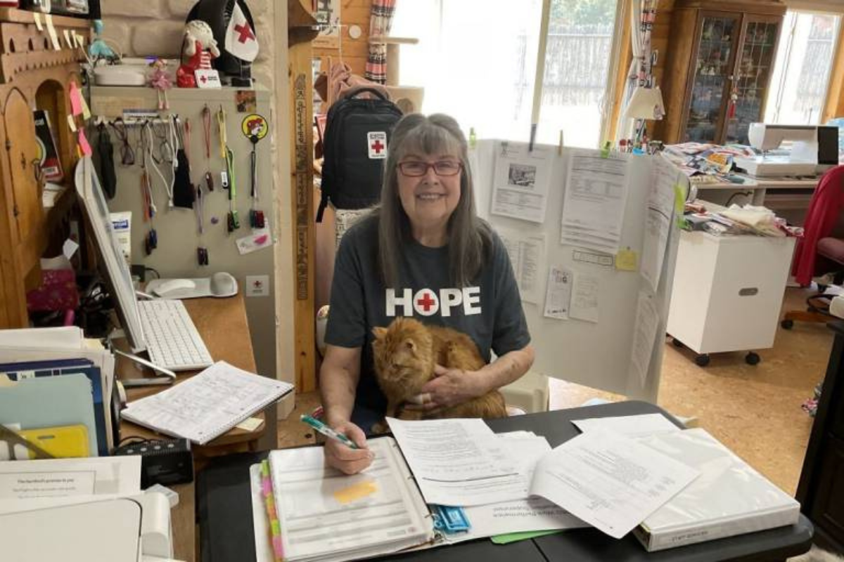 Corrales resident Linda Crowden, an experienced volunteer with the Red Cross, works a virtual assignment helping those affected communicate and reunite with their loved ones. (Red Cross)