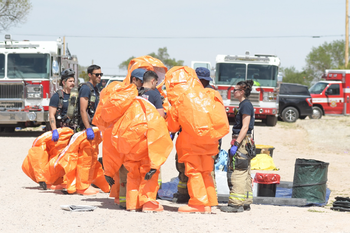 Albuquerque Fire Rescue HazMat teams work May 20 after Three people died and 19 others were hospitalized — including 18 first responders — after an unidentified substance was discovered at a Mountainair residence. (AFR)