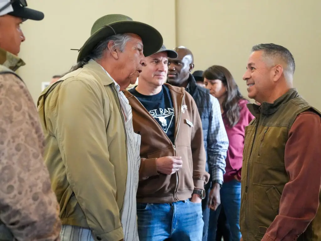 Sen. Luján speaking with community members in Canjilon.