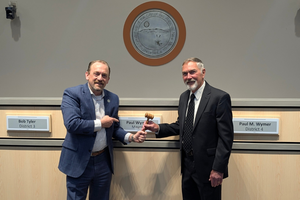 Three-term Rio Rancho Mayor Gregg Hull passed the gavel to new Mayor Paul Wymer at an April 30 ceremony in City Hall. (Kevin Hendricks)