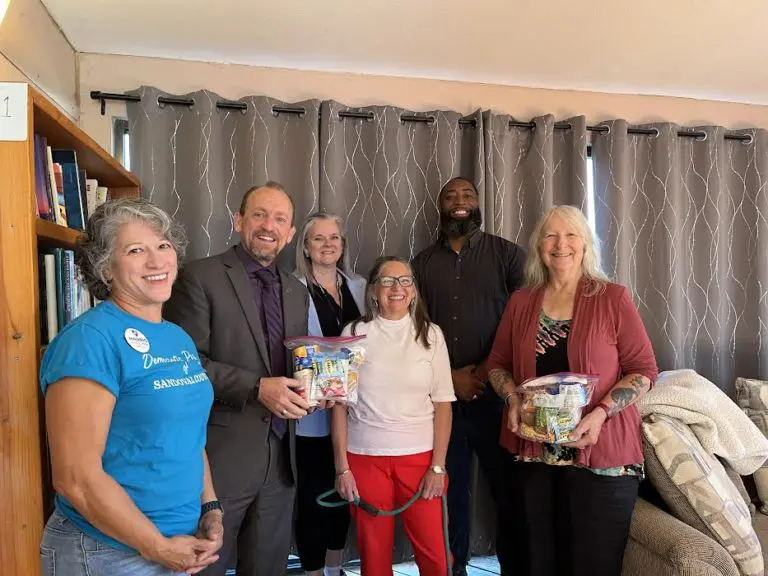 From left: Alex Piland, former Chair, Democratic Party of Sandoval County, former Rio Rancho Mayor Greg Hull, State Rep. Kathleen Cates, Sandoval County Commissioners Katherine Bruch and Josh Jones, and Nika Quirk, Moderator, UUWC Council during a Feed Rio Rancho Kids packing event in 2024. (Kevin Hendricks)