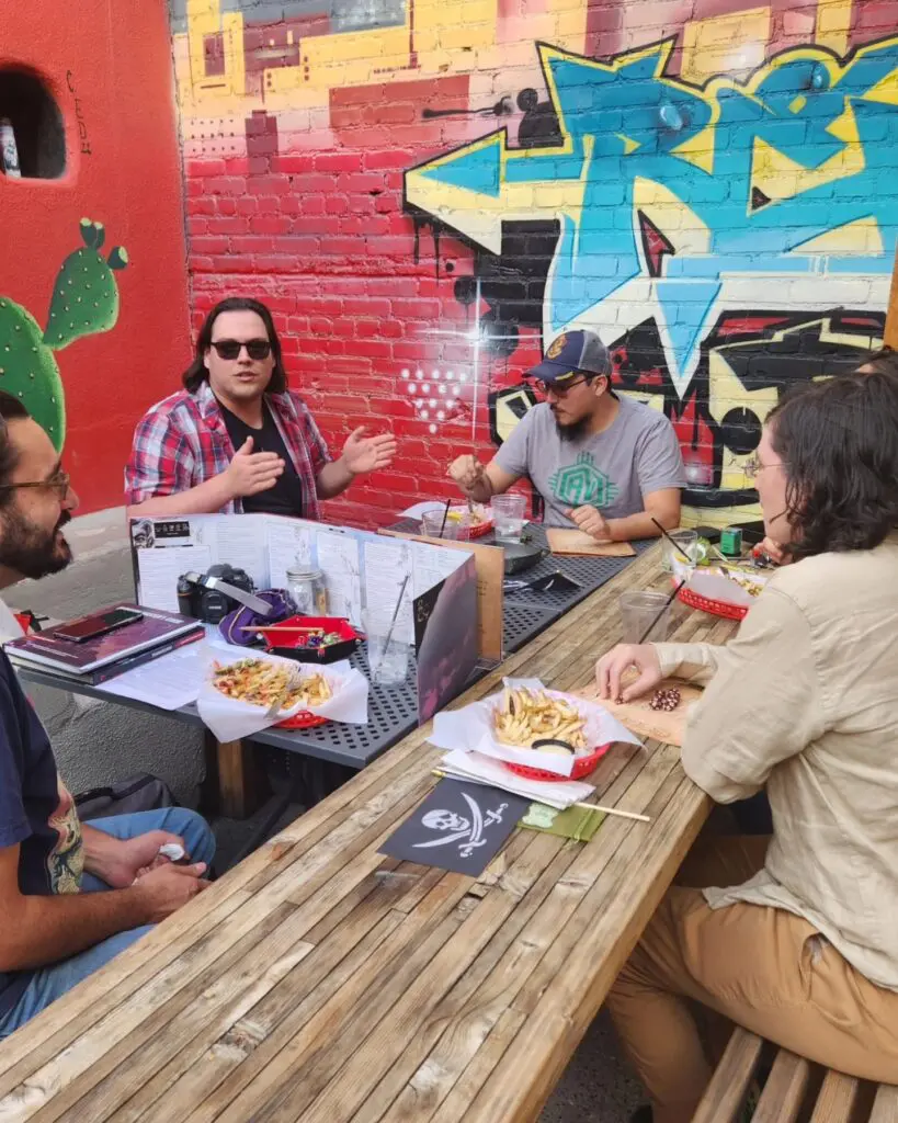 People gathered playing tabletop games together at a DARC event (Courtesy of DARC)