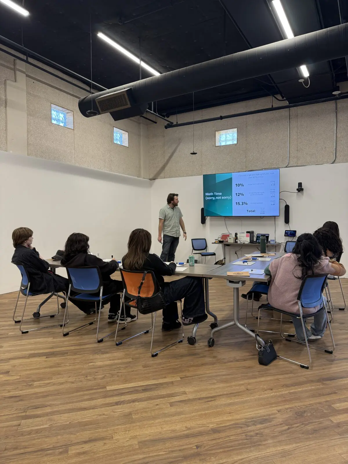 Josh Bien teaching at a workshop apart of Art Hub's Teen Creative Fellowship. (Courtesy of Arts Hub)