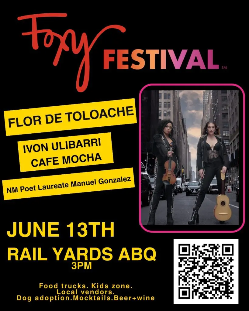 A poster for Foxy Festival with performers holding a guitar.