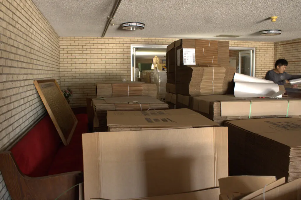 Movers packing in the Shriners Hall (Photo by Sara Atencio-Gonzales)
