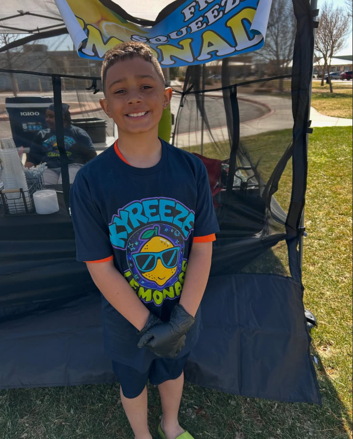 Khalil Lorando runs the Kyreeze Lemonade booth at a local market. With professional signage, branded cups, and a registered LLC, Lorando has transformed a simple lemonade stand into a legitimate business venture.
