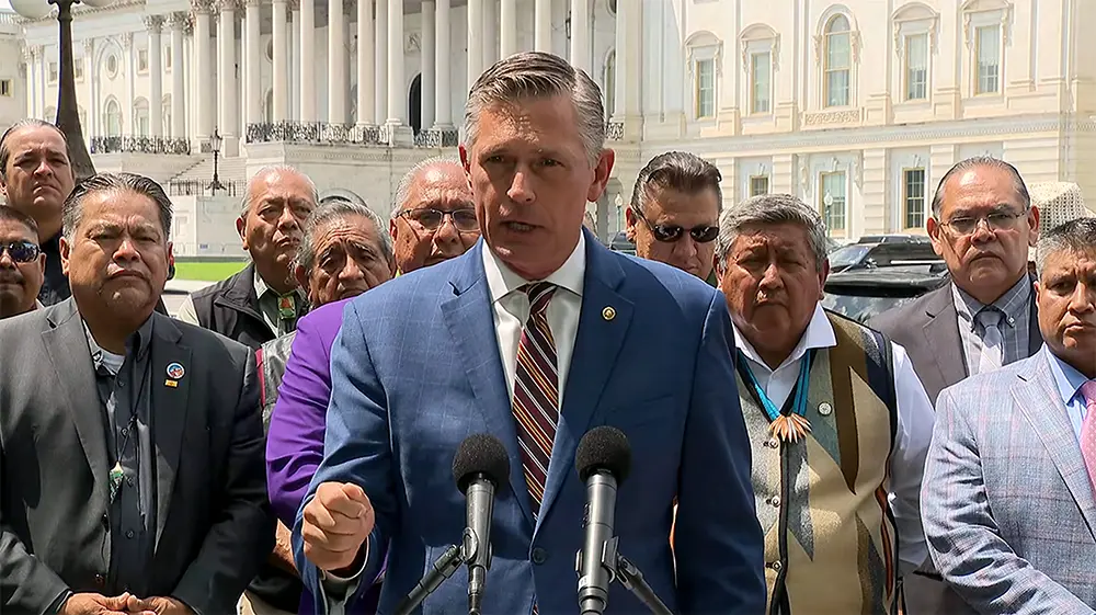 A screenshot from video shows U.S. Sen. Martin Heinrich speaking at a rally outside the U.S. Capitol with Pueblo governors standing behind him.