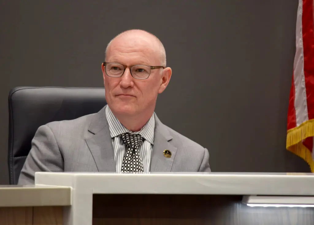 Bernalillo County Commissioner Walt Benson listens to public testimony during a past board meeting. Benson is urging residents to weigh in before commissioners vote on whether to put a voluntary public financing proposal on the November ballot. (Jesse Jones)