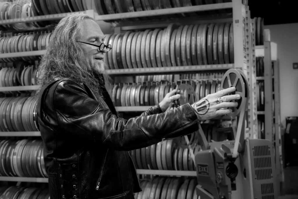 Bryan Konefsky looking through film archives (Courtesy of Bryan Konefsky) 