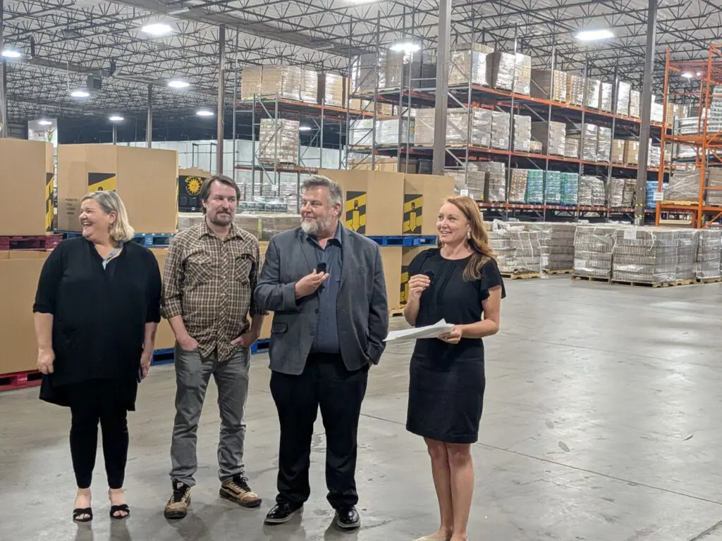 U.S. Rep. Melanie Stansbury, right, toured Roadrunner Food Bank on Aug. 10, warning that federal cuts have stripped food assistance from more than 21,000 New Mexicans, about half of them children, since October. (Kevin Hendricks)