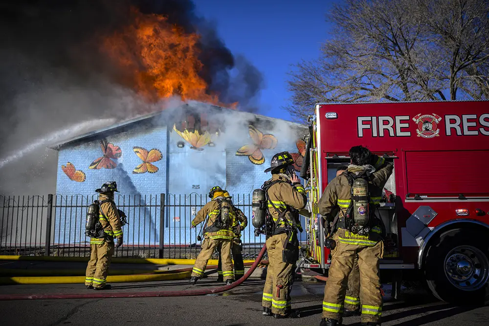 Albuquerque Fire Rescue personnel work a fire at an apartment complex. The department accounts for the largest share of the city’s projected budget shortfall. Photo by Roberto E. Rosales for the Paper