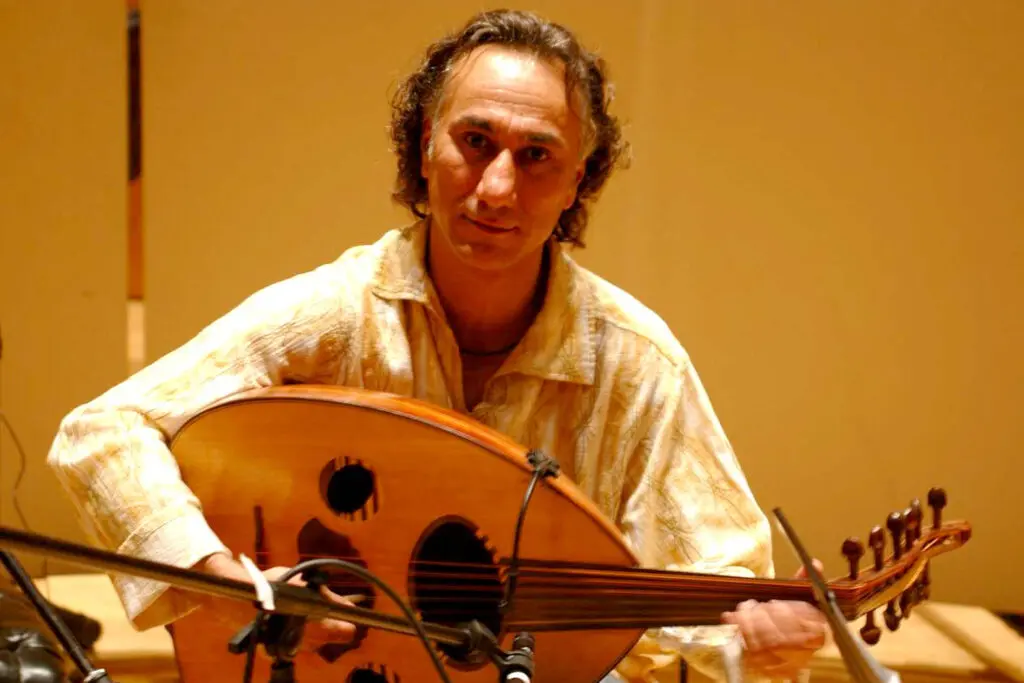 Musician Rahim AlHaj plays the oud.