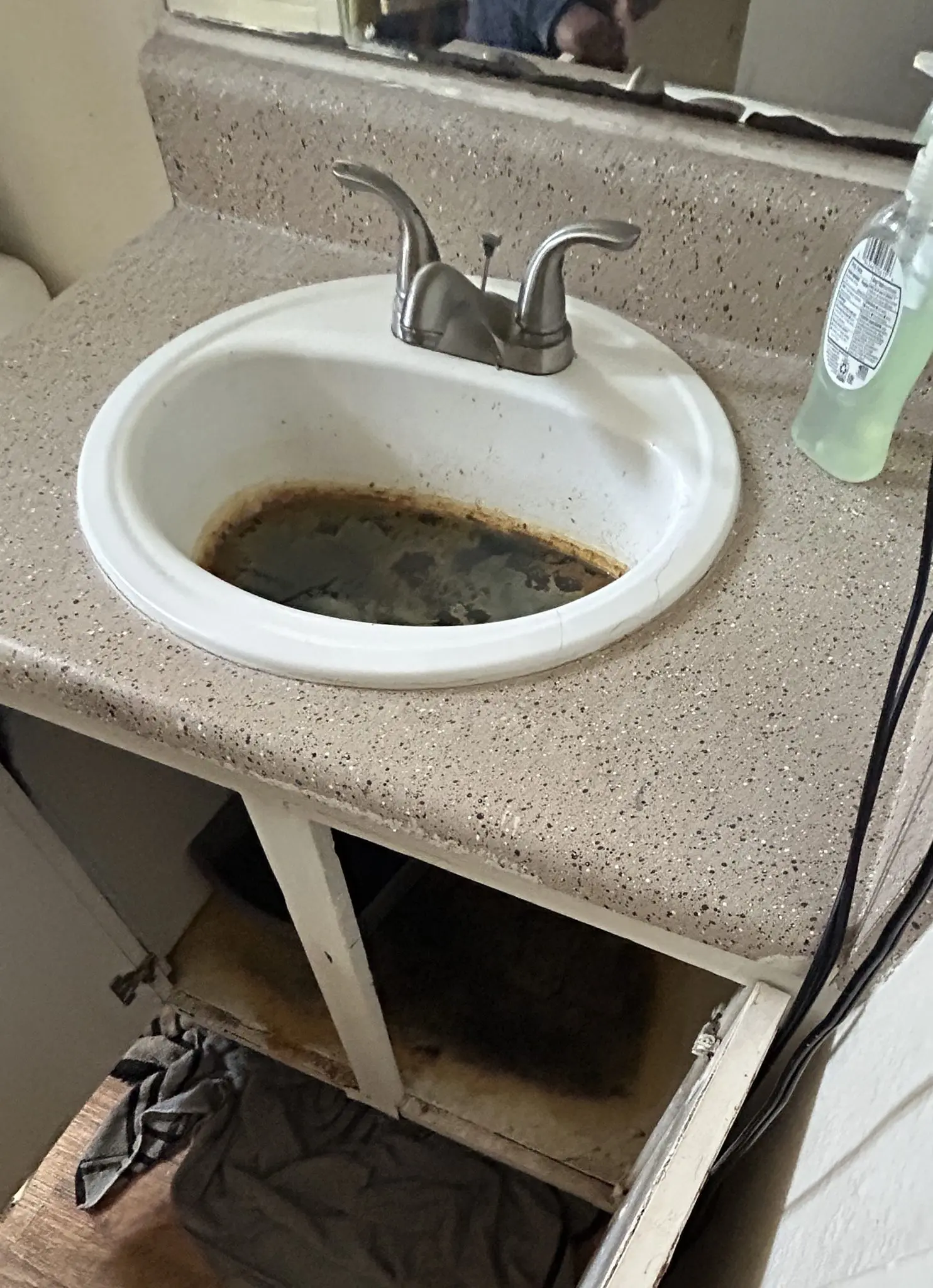 A sink filled with sewage at Mont44 Apartments. Courtesy of CABQ.