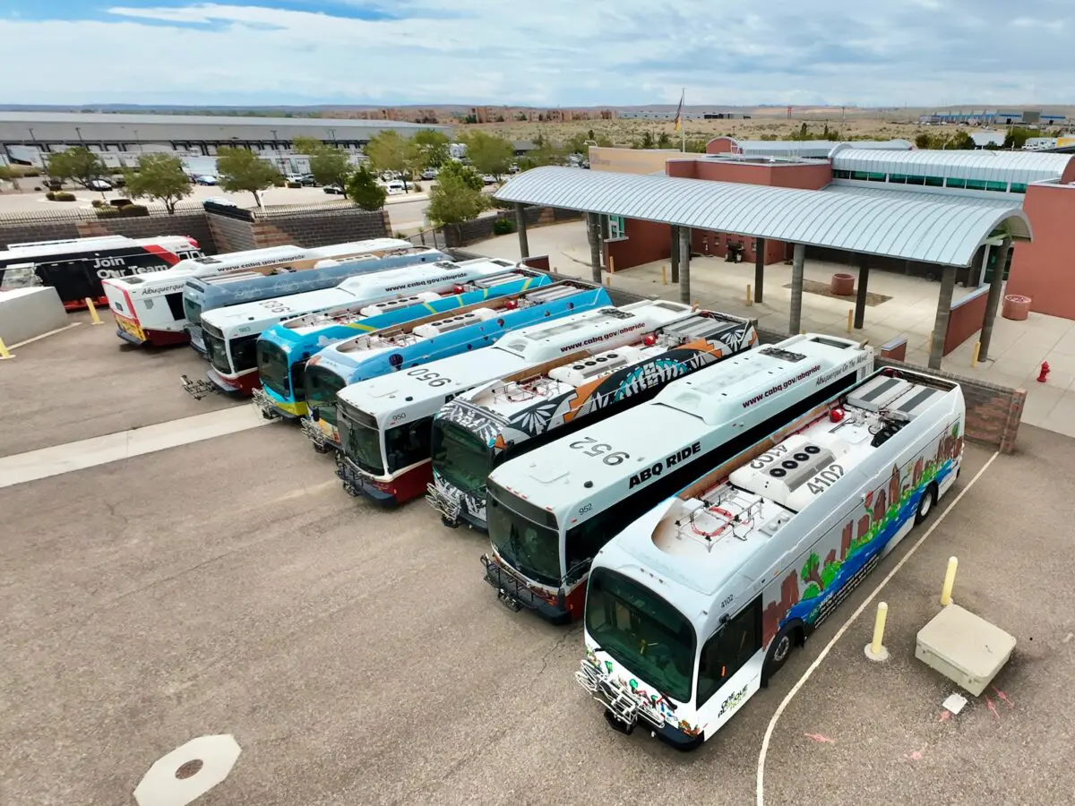 ABQ RIDE’s five electric buses sit among other buses at the Ken Sanchez Transit Facility in Albuquerque. The electric buses have not been in service since December because of mechanical problems and difficulty obtaining parts. Photo by Roberto E. Rosales for the Paper