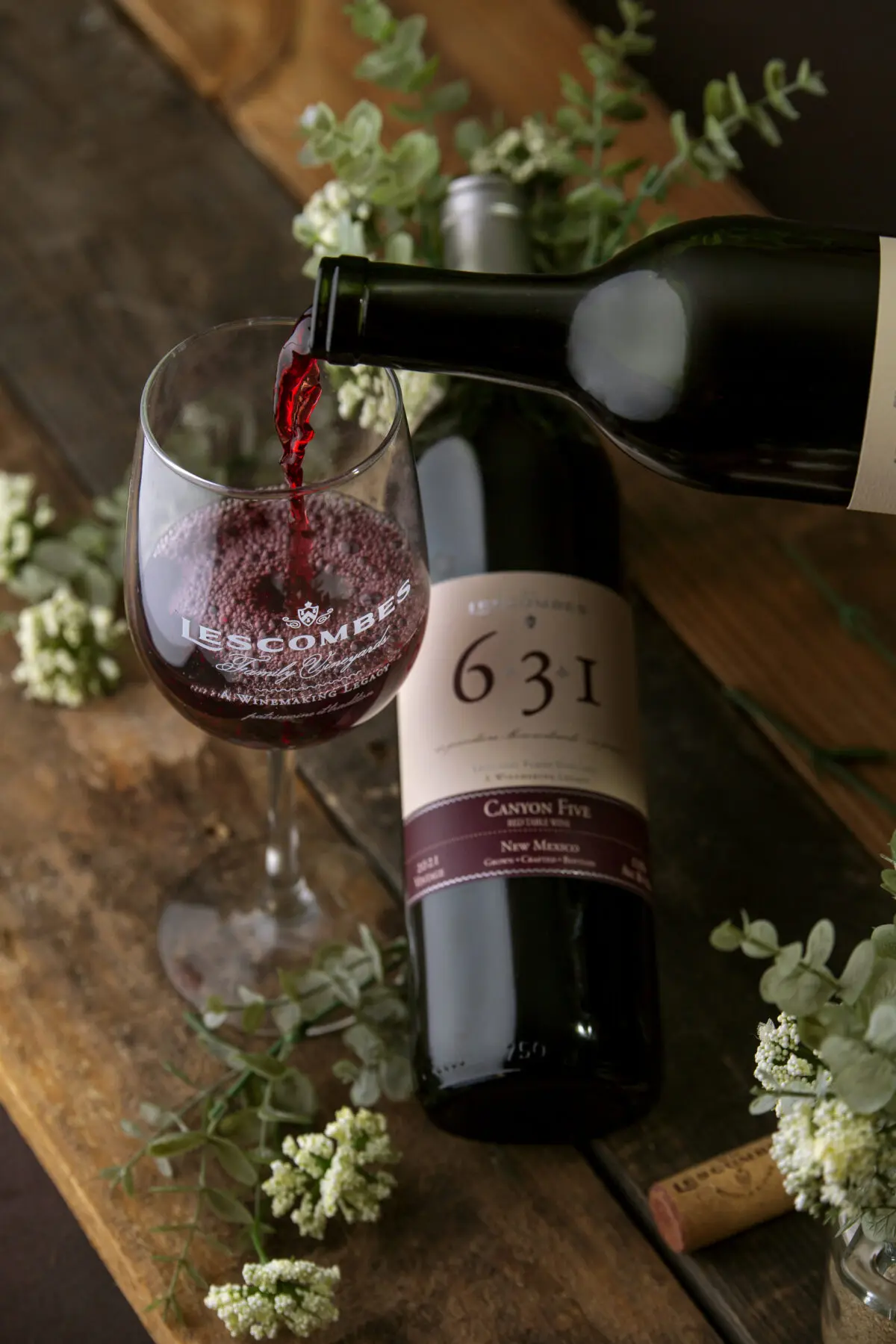 A bottle of red win from Lescombes Family Vineyards
