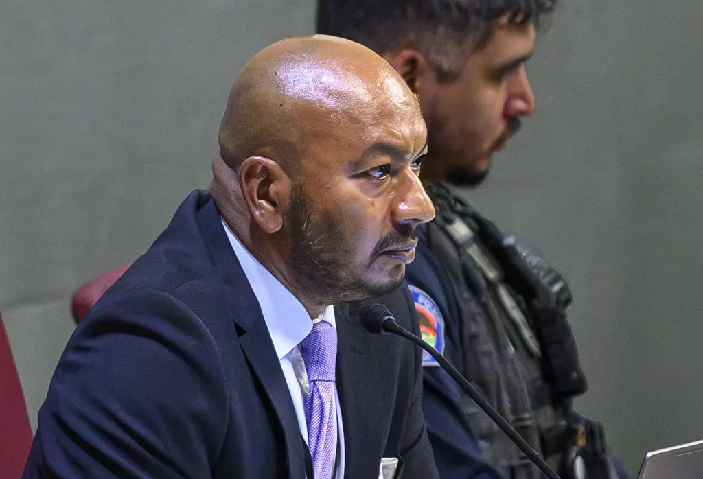 Joshua Boone, Mayor Tim Keller’s pick for city attorney, attends the Albuquerque City Council meeting on Sept. 21, 2026, when councilors approved two overdue quarterly litigation reports.
Photo by Roberto E. Rosales for the Paper