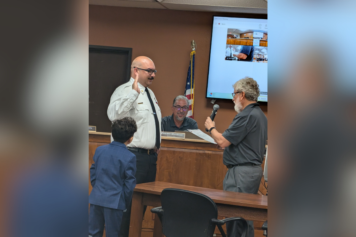 Bryan Picchione is sworn in as fire chief by Bernalillo Mayor Jack Torres on Sept. 28. (Courtesy photo)