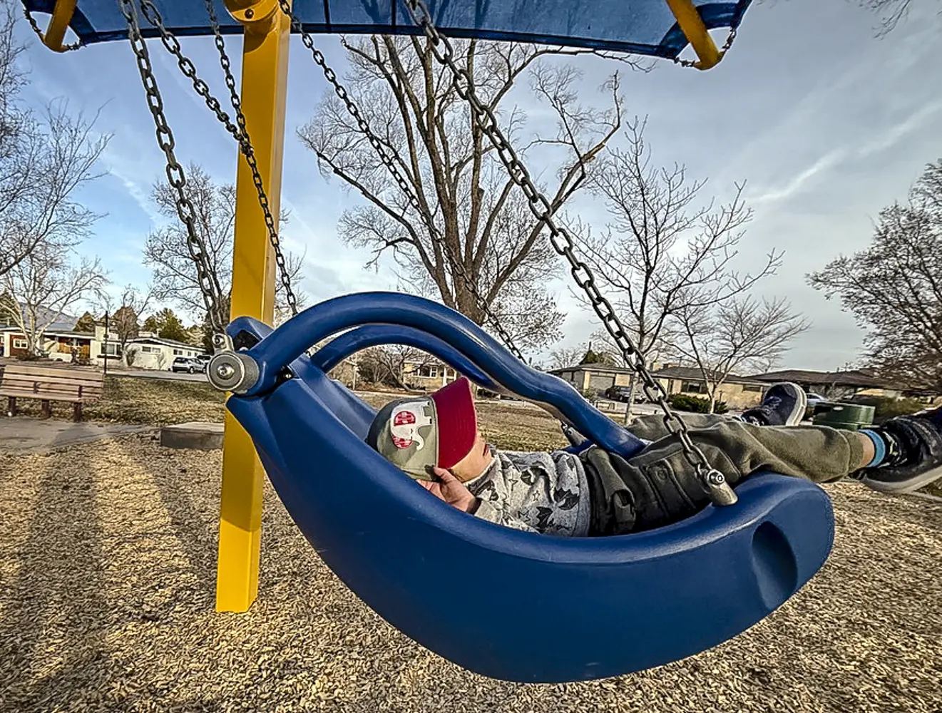 A child plays on a playground as advocates discuss policies to improve the well-being of New Mexico children and families.
Photo by Roberto E. Rosales for the Paper