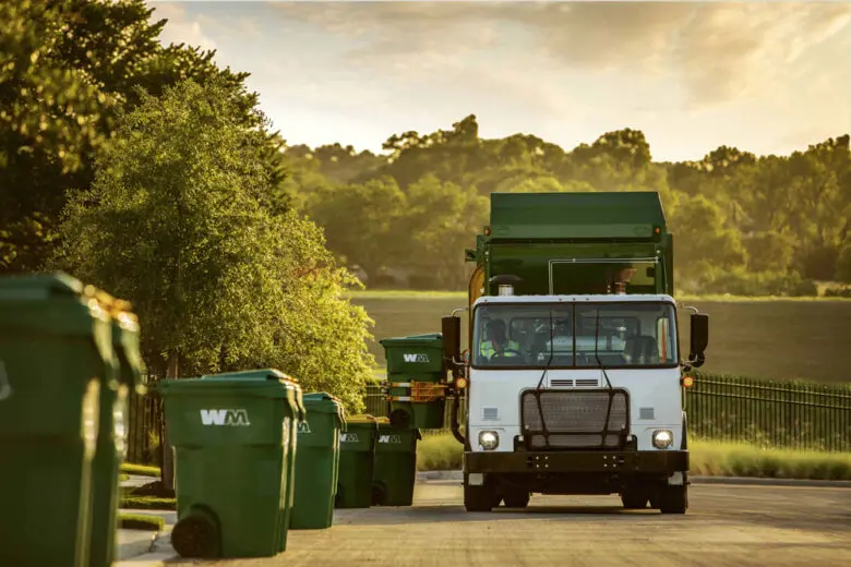 A Waste Management truck picks up residential trash cans. Severe weather has delayed trash collection in Rio Rancho. (Courtesy of Waste Management)