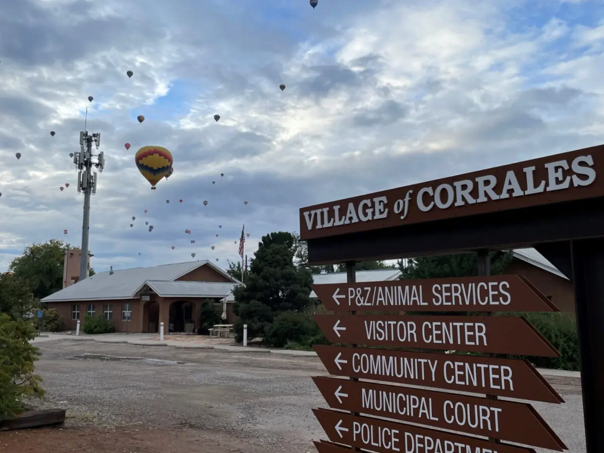 Hot air balloons float over the Village of Corrales offices.