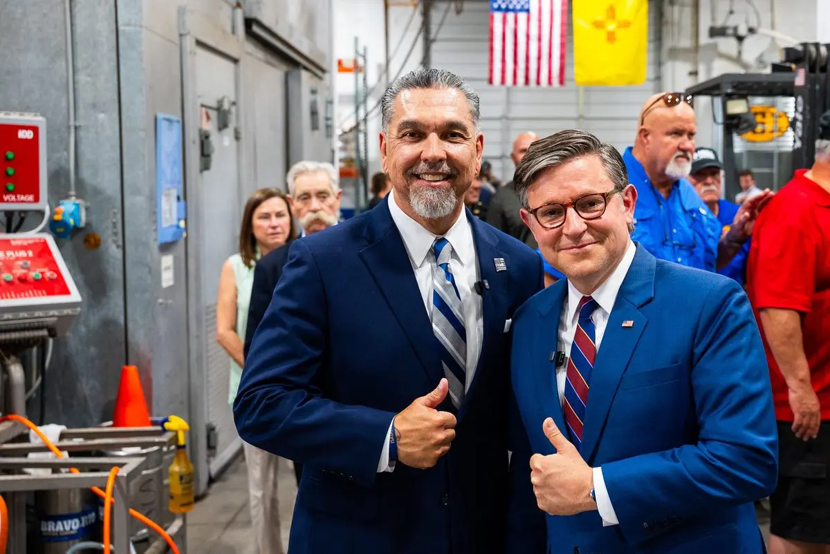 U.S. Speaker Mike Johnson (r) and Greg Cunningham