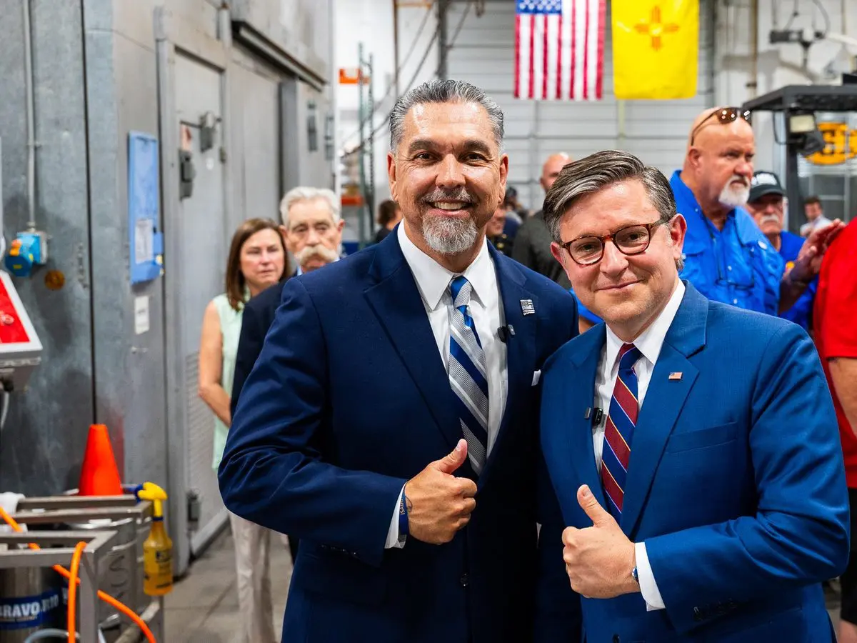 U.S. Speaker Mike Johnson (r) and Greg Cunningham