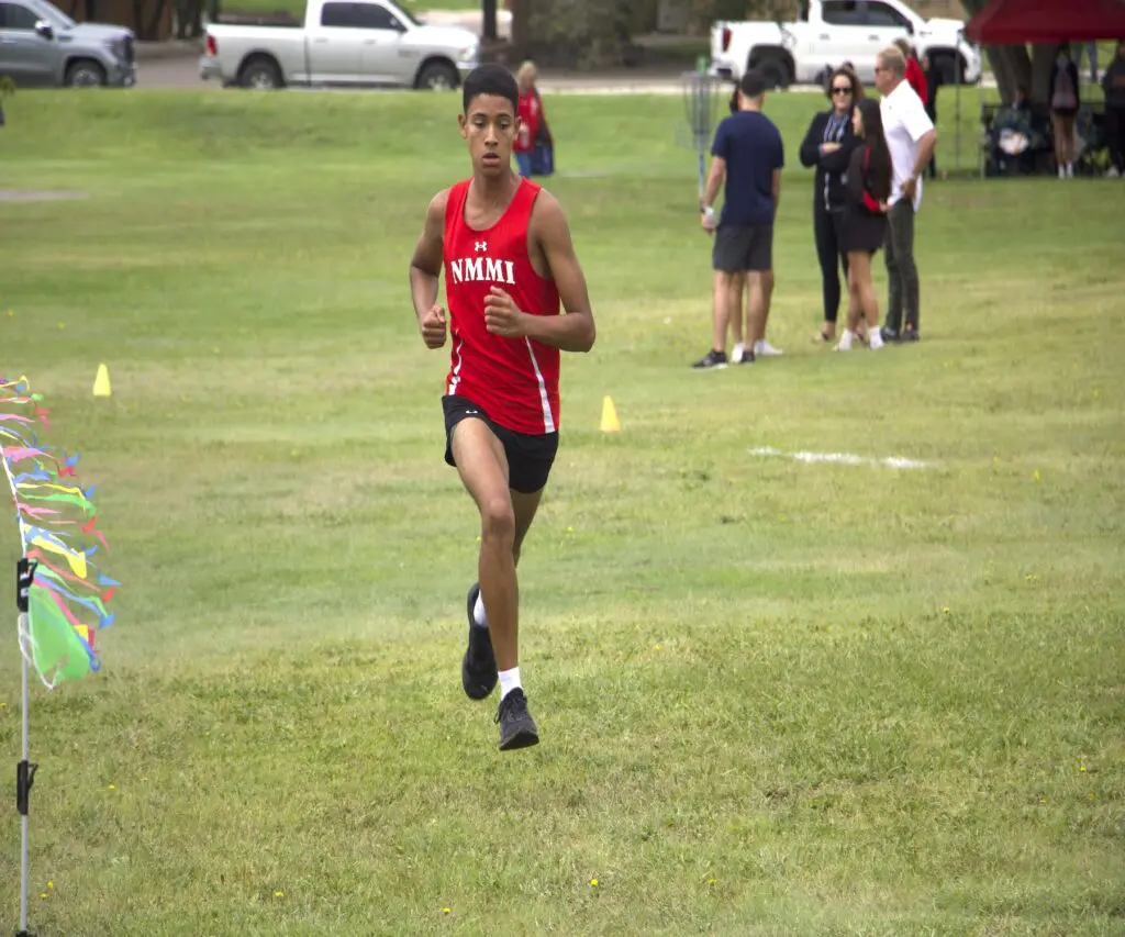 New Mexico Military Institute senior Gabriel Lopes races toward the finish line at the Pecos Valley Invitational.