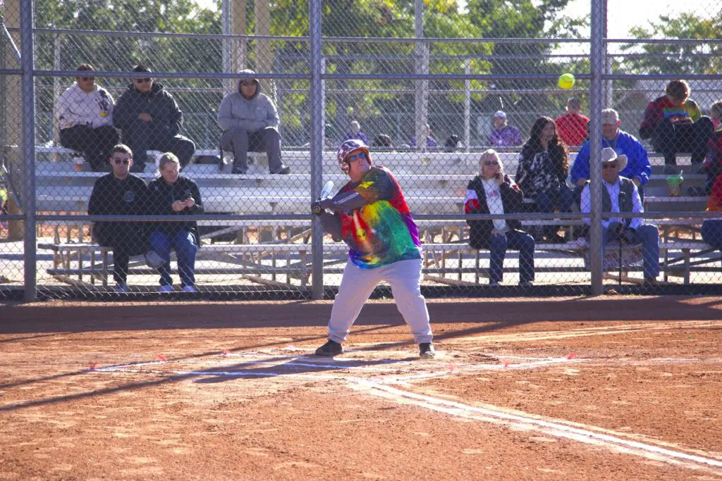 A Roswell batter swings for the fence at the Area 4 softball tournament