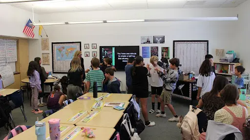 Students strike a pose during an arts-integrated lesson. They have one minute to form a tableau, a frozen scene built with their bodies, to show what they learned. (Courtesy of Rio Rancho Public Schools)
