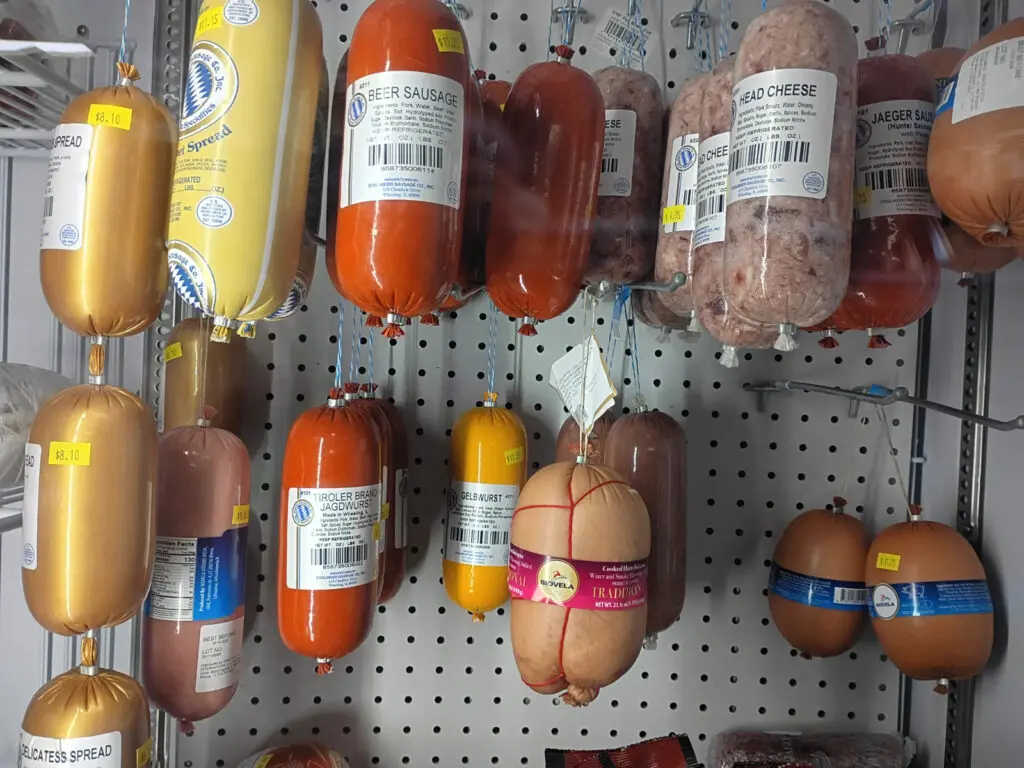 Sausages hand in a cooler.