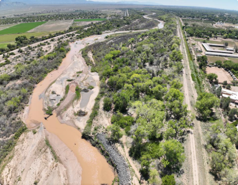 A pre construction view from September 11, 2025, looking downstream at the Corrales River Mile 199 Project area, showing lateral river migration that threatened levees on both sides of the Rio Grande. Reclamation photo
