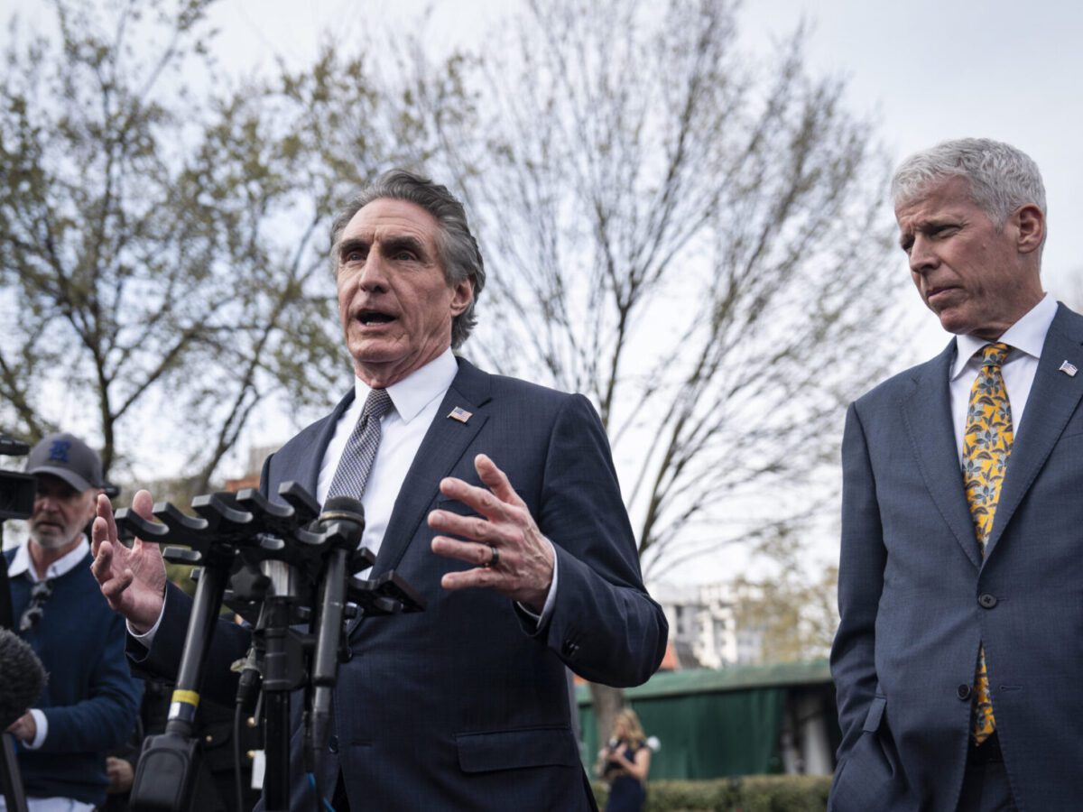 Interior Secretary Doug Burgum, left, and Energy Secretary Chris Wright outside the West Wing at the White House on March 19.
