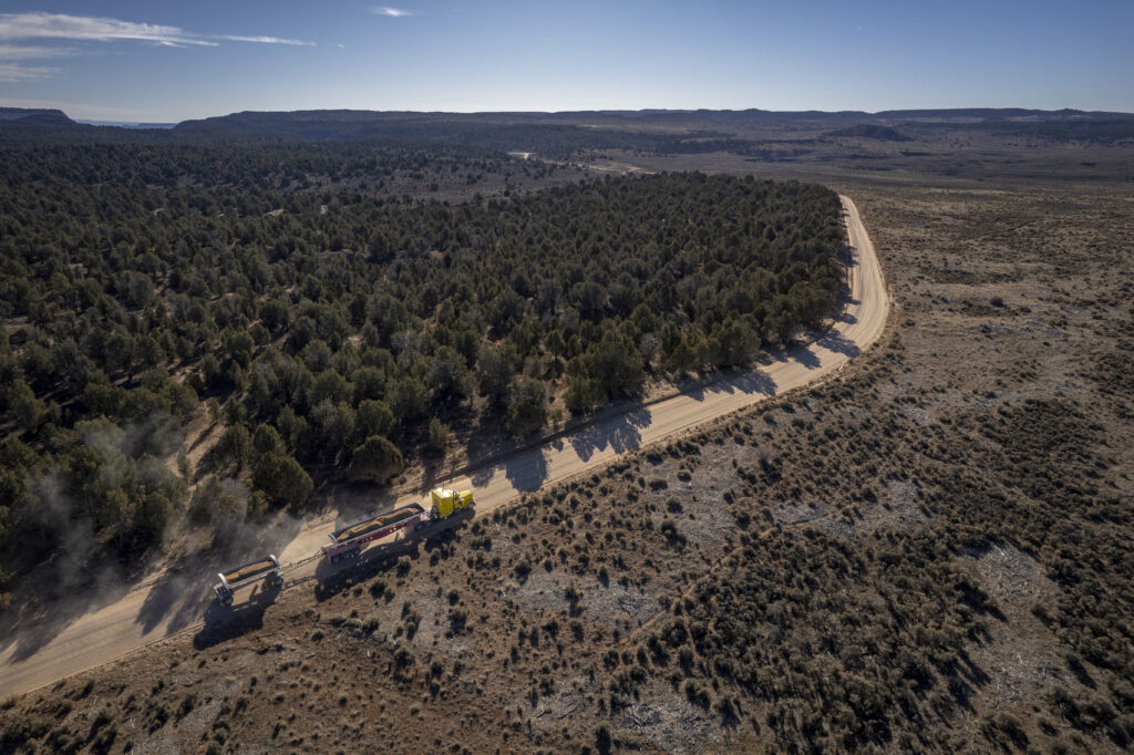 A truck drives down Skutumpah Road in Kane County, Utah, in December. The road marks the border of Grand Staircase-Escalante National Monument, left, and land overseen by the Bureau of Land Management in partnership with Utah. James Roh/For The Washington Post
