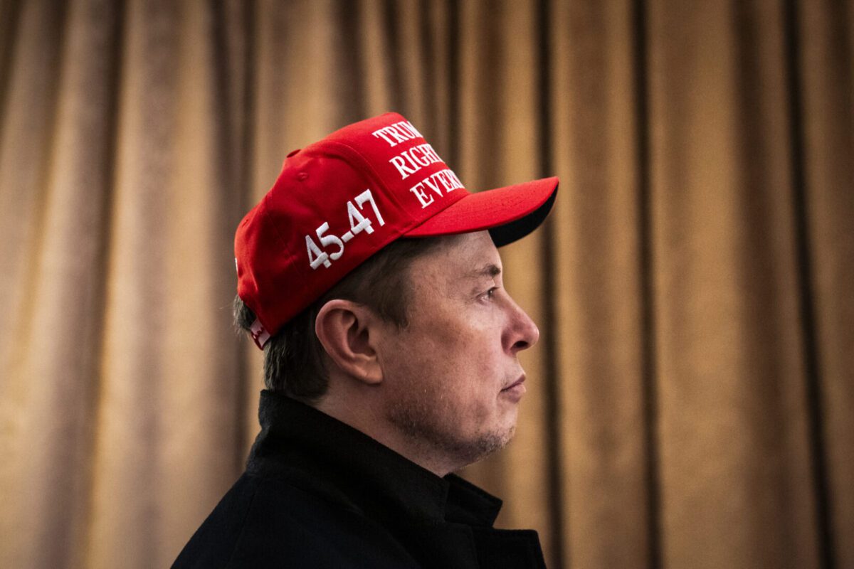 Elon Musk listens to President Donald Trump during a Cabinet meeting in March.