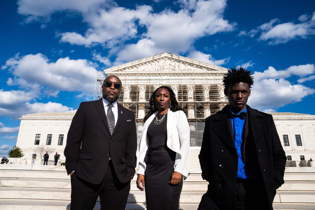 From left, Hilliard Toi Cliatt, Curtrina Martin and Gabe Watson in March outside the Supreme Court, where the justices will consider whether they can sue the FBI for mistakenly raiding the suburban Atlanta house where they lived. Demetrius Freeman/The Washington Post