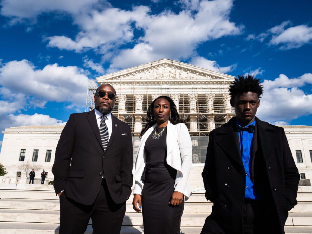 From left, Hilliard Toi Cliatt, Curtrina Martin and Gabe Watson in March outside the Supreme Court, where the justices will consider whether they can sue the FBI for mistakenly raiding the suburban Atlanta house where they lived. Demetrius Freeman/The Washington Post