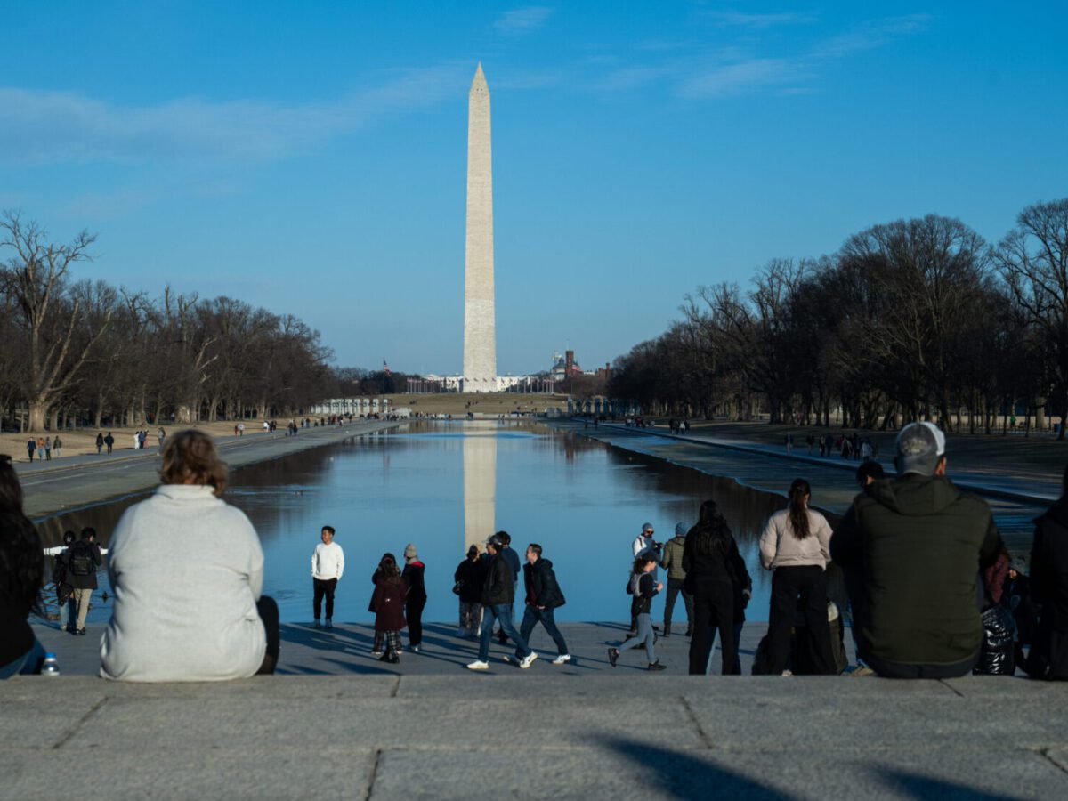 Tourists visit the National Mall in February.