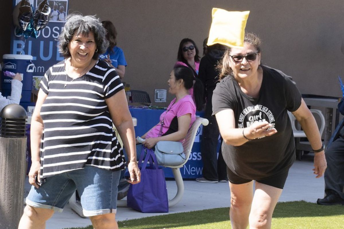 Women play Cornhole at last year's Senior Health and Fitness Day event in Albuquerque. (Source: CABQ)