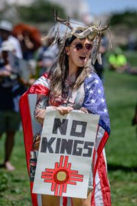 On June 14, thousands in the Albuquerque community showed up for the No Kings Rally held at Mariposa Basin Park in Taylor Ranch. This is one of thousands planned throughout the country on Saturday. Pictured is Molly Cruz chanting during the even.