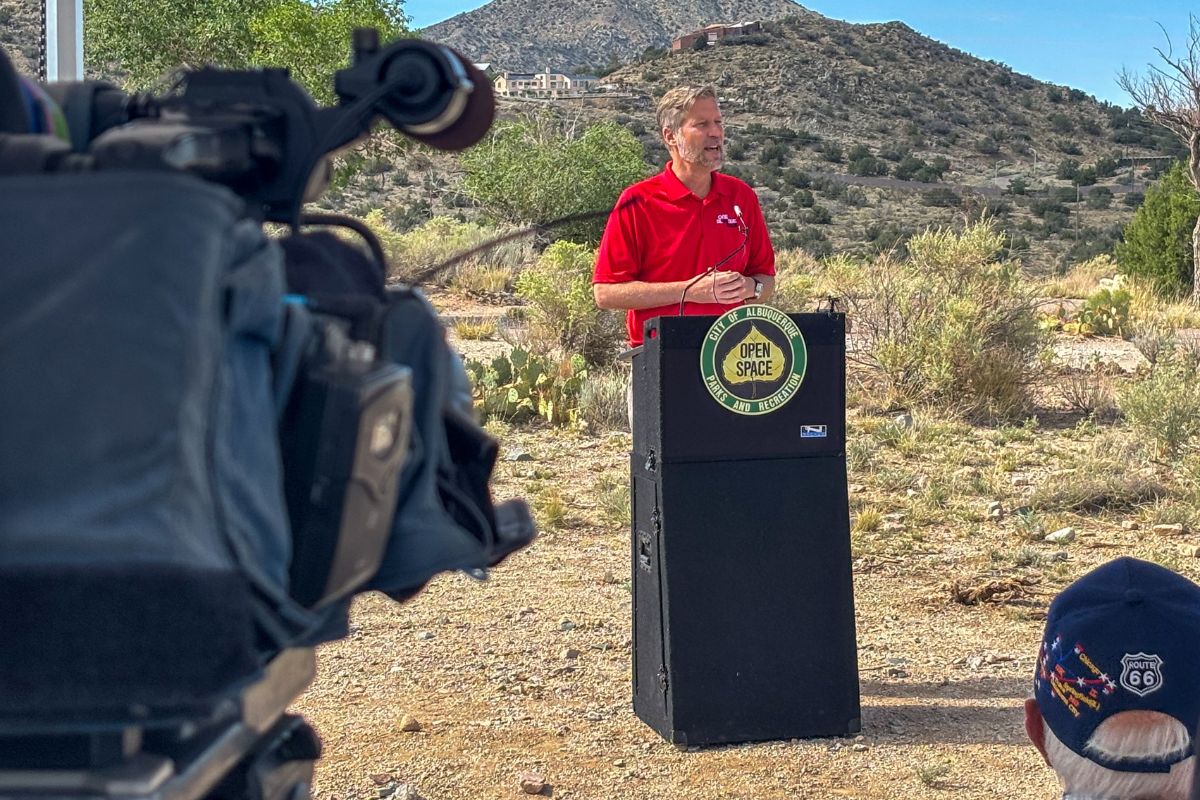 Albuquerque Mayor Tim Keller speaks at the official opening of the Route 66 Open Space Trailhead — a long-awaited project that links Albuquerque’s cultural history with greater public access to nature and the East Mountains. (Andrea Vasquez)
