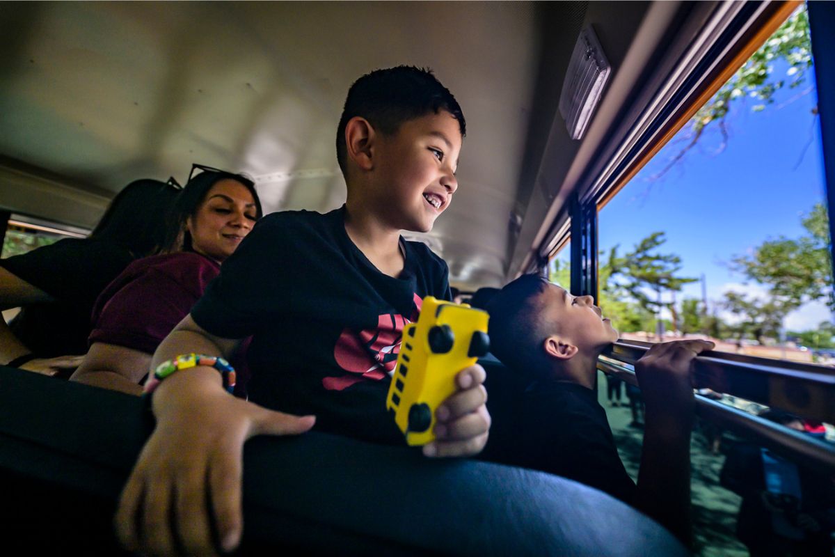 Isaiah Trujillo, shown riding the bus last year, is one of thousands of New Mexico students heading back to school this month. (Roberto E. Rosales)