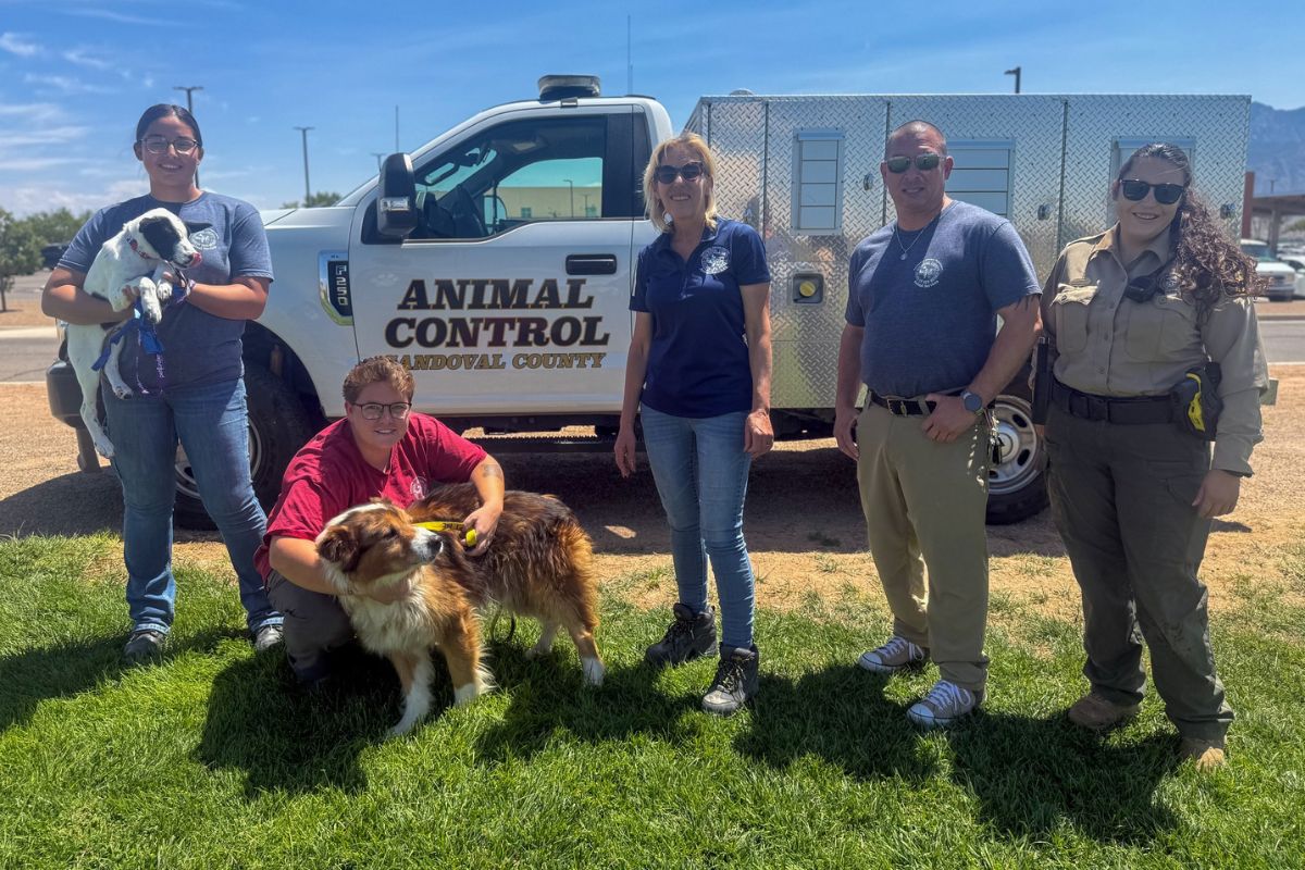 from left: Animal Care Associates Karol Mata, Analyice Yarnell, and Kim Jaramillo, Animal Care Supervisor Mark Webb, and Animal Control Officer Kimberly Ashcraft. Dogs from left: Kiwi and Teddy