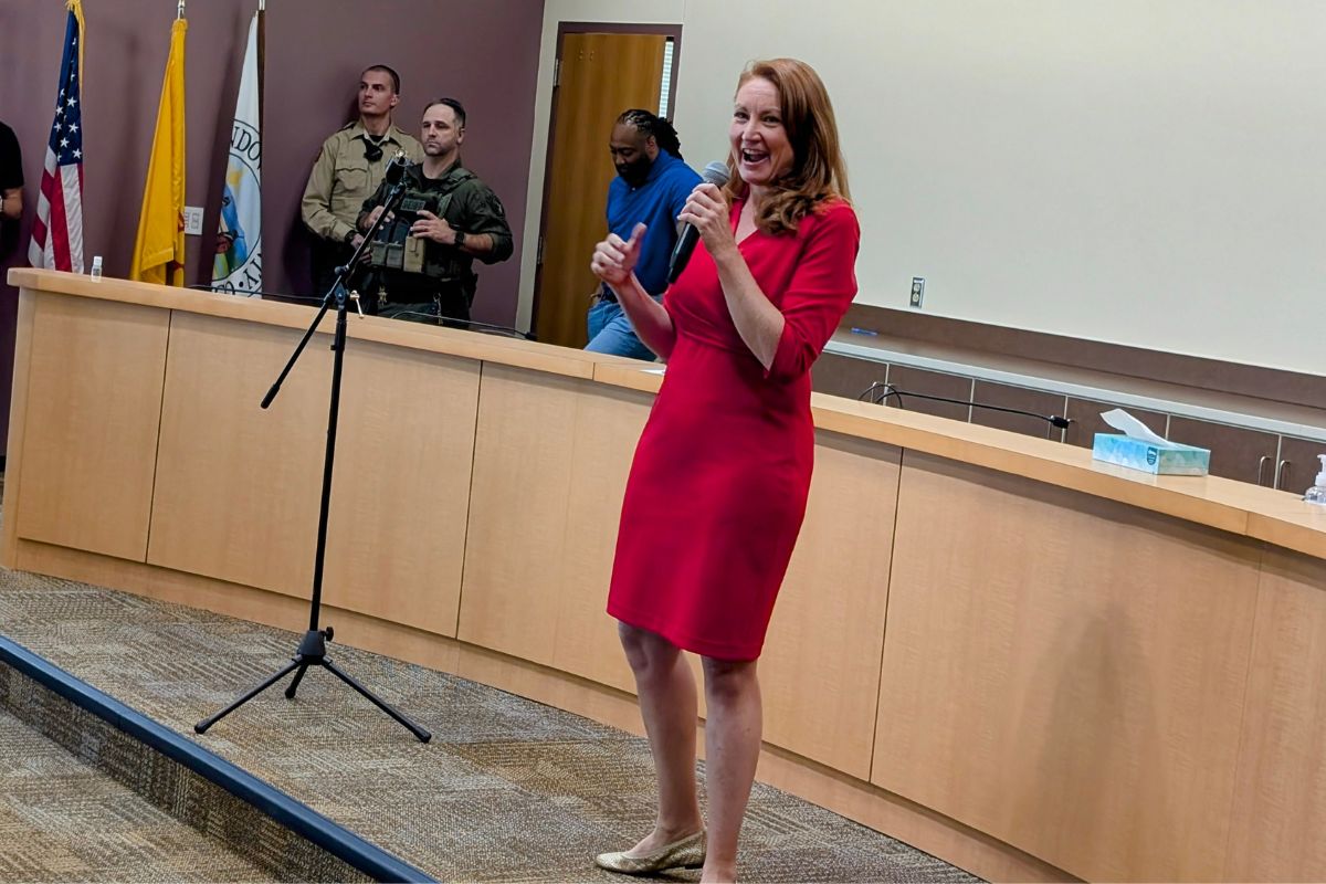 U.S. Rep. Melanie Stansbury talks during a town hall meeting inside a packed commission chambers at the Sandoval County Administration Building Monday afternoon.